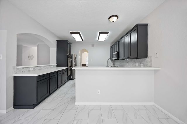 15 Finetta Lane, Alvin, TX 77511