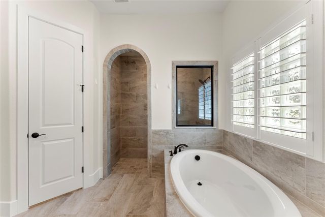18 Dawning Flower Drive, Tomball, TX 77375