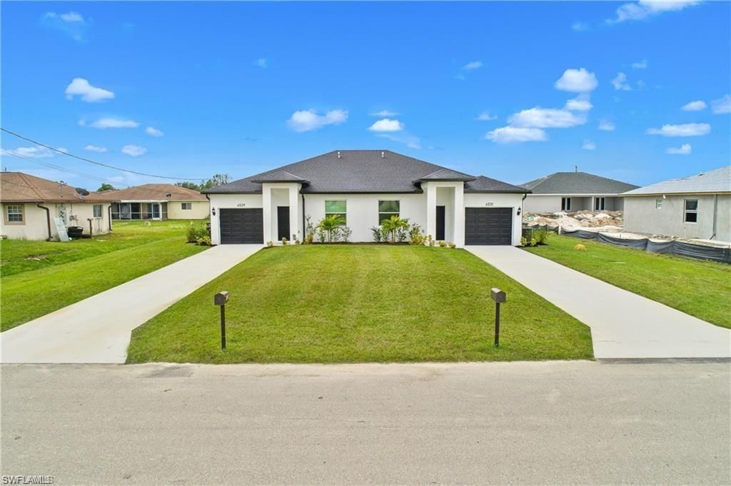 4717-4719 25th ST SW, LEHIGH ACRES, FL 33973 — exterior