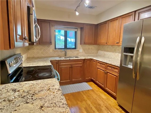 1148 Riverbend Club SE Drive, Atlanta, GA 30339