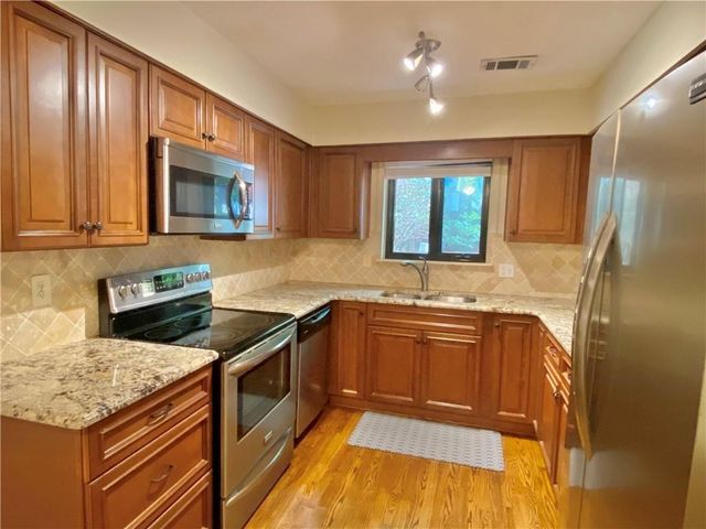 1148 Riverbend Club SE Drive, Atlanta, GA 30339