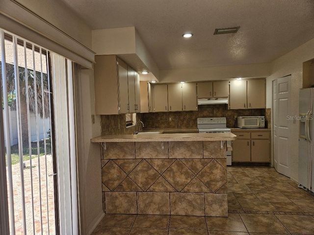 355 SPRING LAKE BOULEVARD NW, Port Charlotte, FL 33952