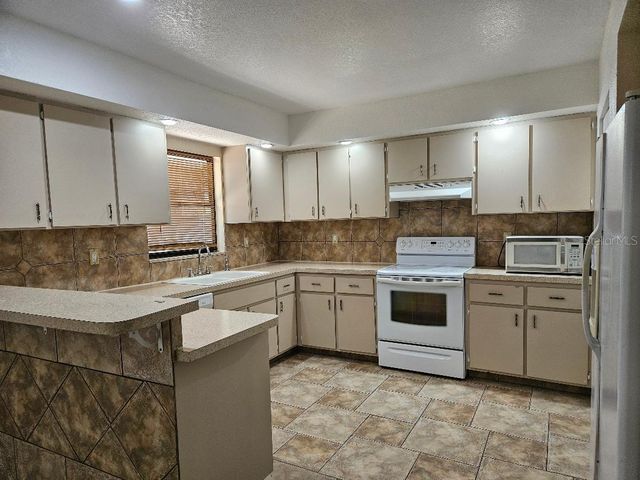 355 SPRING LAKE BOULEVARD NW, Port Charlotte, FL 33952