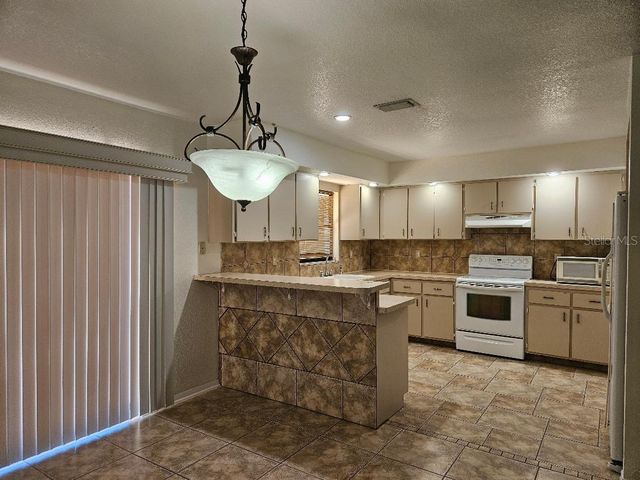 355 SPRING LAKE BOULEVARD NW, Port Charlotte, FL 33952