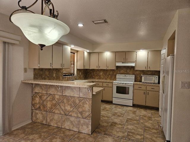 355 SPRING LAKE BOULEVARD NW, Port Charlotte, FL 33952