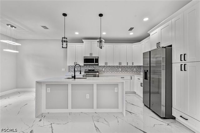 928 Milwaukee BLVD, Lehigh Acres, FL 33974