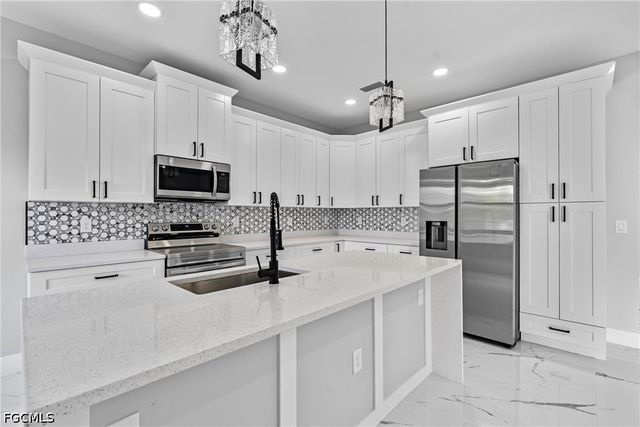 928 Milwaukee BLVD, Lehigh Acres, FL 33974