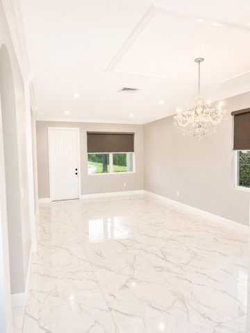 4773 Foxtail Palm Court, Greenacres, FL 33463