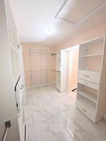 4773 Foxtail Palm Court, Greenacres, FL 33463