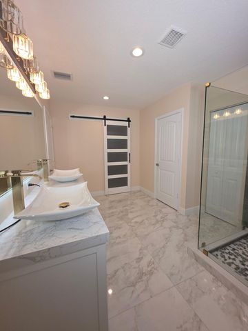 4773 Foxtail Palm Court, Greenacres, FL 33463