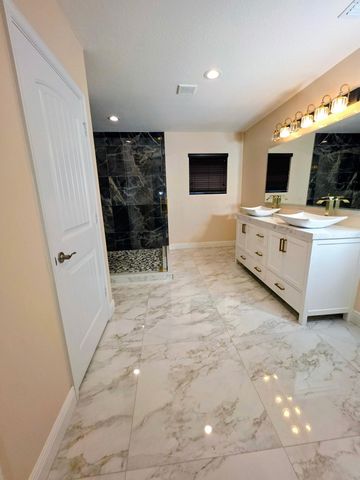 4773 Foxtail Palm Court, Greenacres, FL 33463