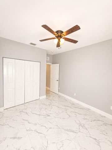4773 Foxtail Palm Court, Greenacres, FL 33463
