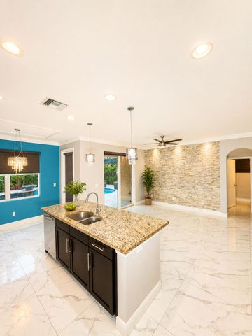 4773 Foxtail Palm Court, Greenacres, FL 33463