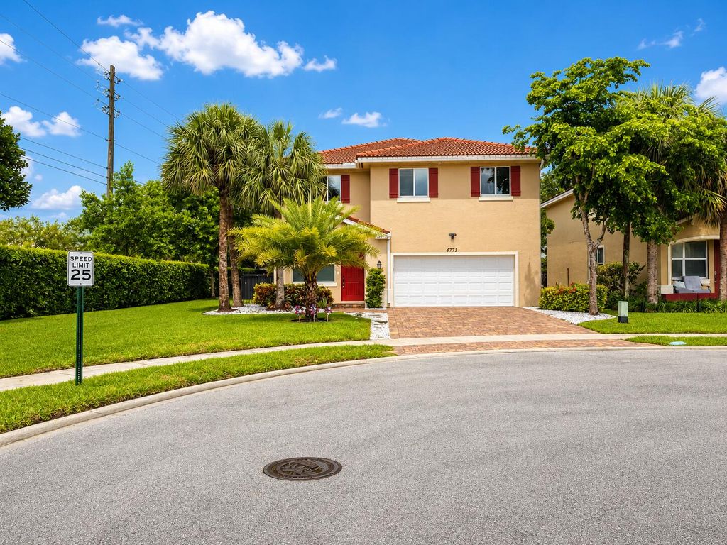 4773 Foxtail Palm Court, Greenacres, FL 33463