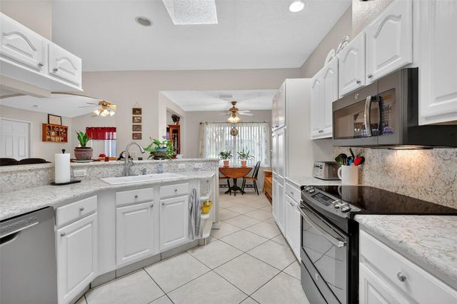 21811 KING HENRY AVENUE, Leesburg, FL 34748