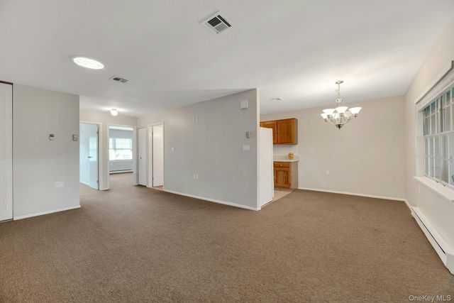 164 Falmouth Court E, Ridge, NY 11961