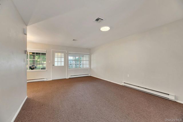 164 Falmouth Court E, Ridge, NY 11961