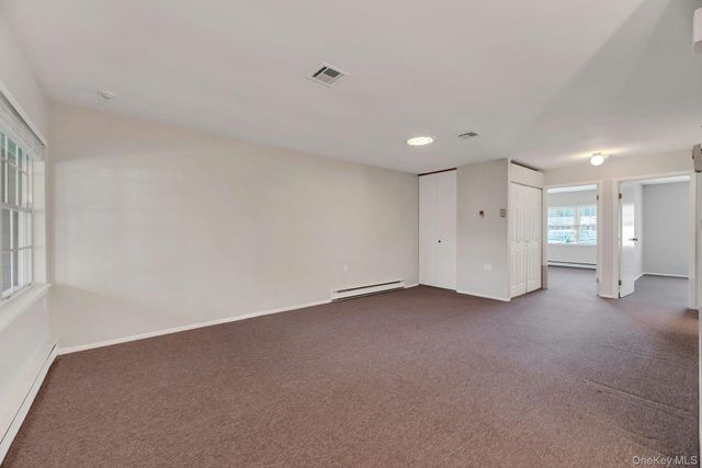 164 Falmouth Court E, Ridge, NY 11961