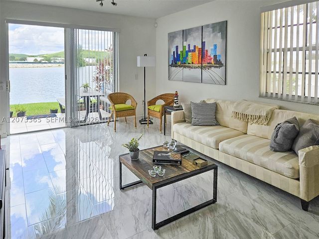 4135 Crystal Lake Dr, Deerfield Beach, FL 33064
