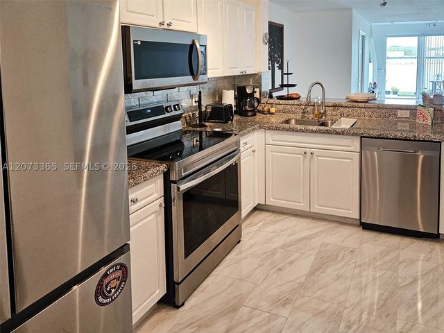 4135 Crystal Lake Dr, Deerfield Beach, FL 33064