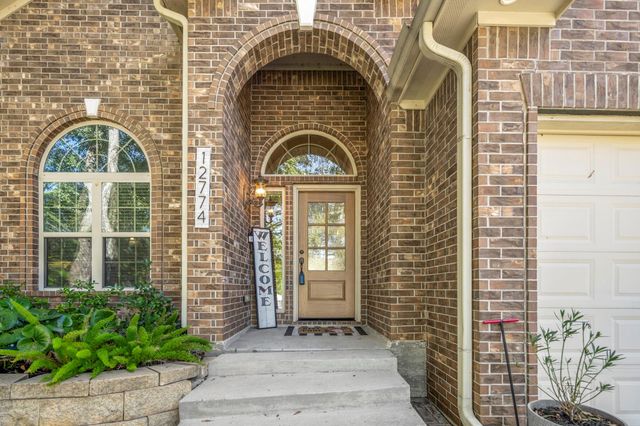 12774 Point Aquarius Boulevard, Willis, TX 77318