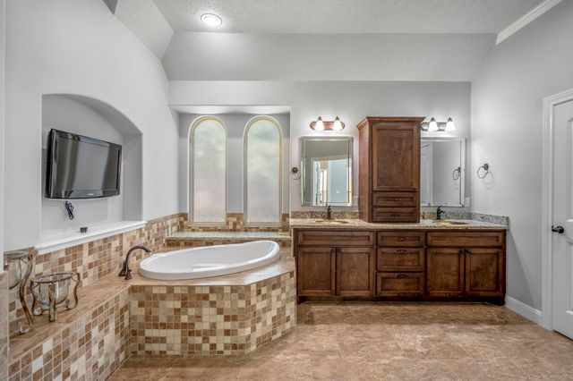 12774 Point Aquarius Boulevard, Willis, TX 77318