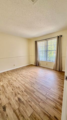 9121 E Highland Pines Drive, Palm Beach Gardens, FL 33418