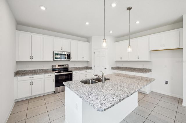 12910 TROVITA DRIVE, Grand Island, FL 32735