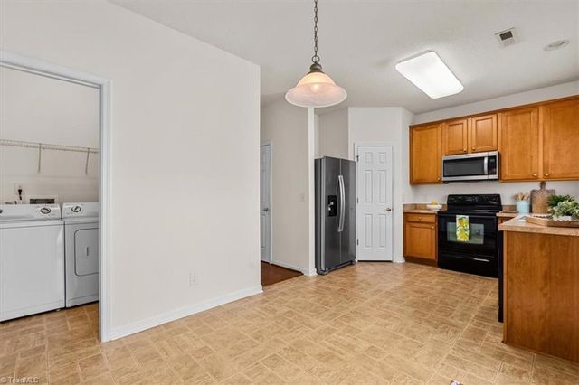 6886 Derby Run Drive, Whitsett, NC 27377