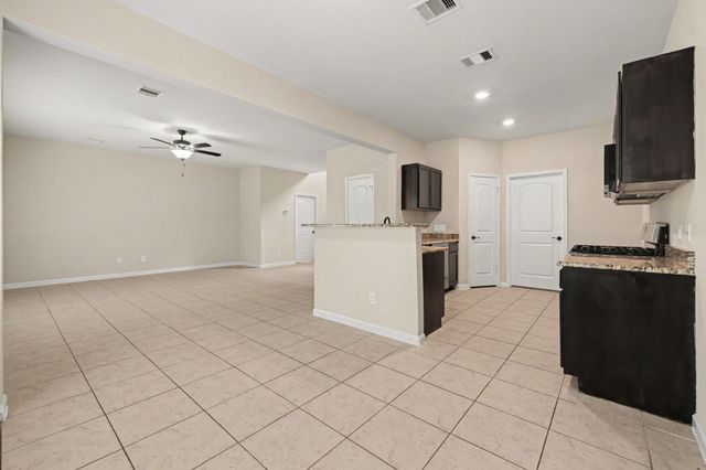 7711 Boulder Sunstone Lane, Conroe, TX 77304