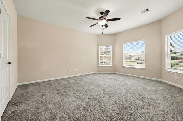 7711 Boulder Sunstone Lane, Conroe, TX 77304