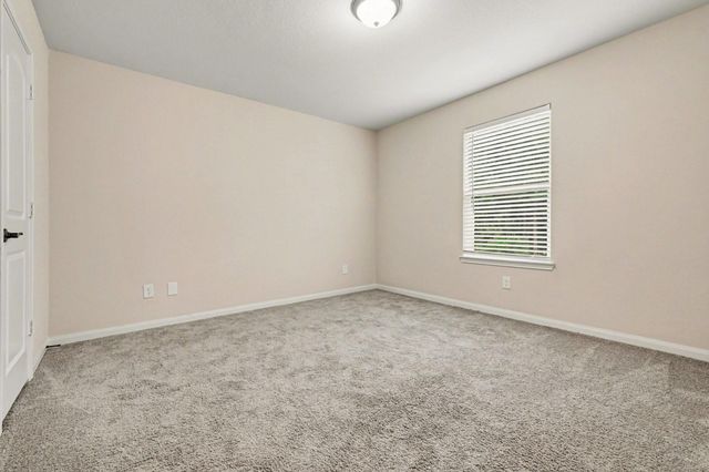 7711 Boulder Sunstone Lane, Conroe, TX 77304