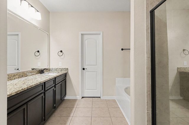 7711 Boulder Sunstone Lane, Conroe, TX 77304