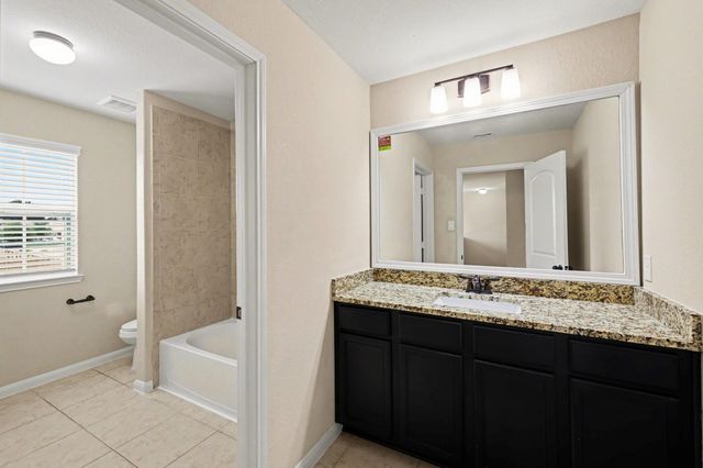 7711 Boulder Sunstone Lane, Conroe, TX 77304