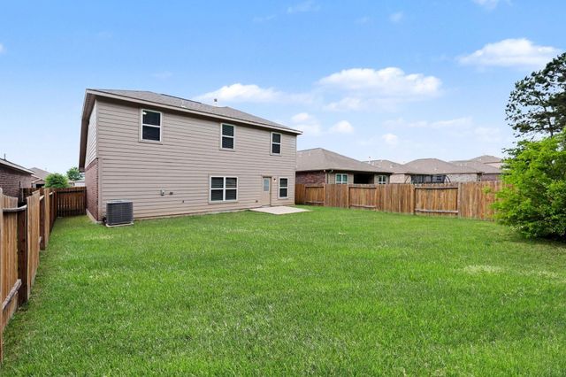 7711 Boulder Sunstone Lane, Conroe, TX 77304