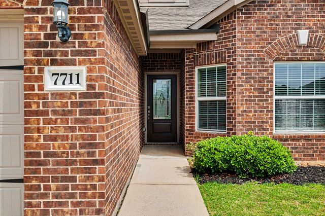 7711 Boulder Sunstone Lane, Conroe, TX 77304
