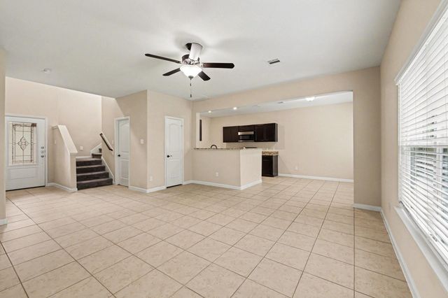 7711 Boulder Sunstone Lane, Conroe, TX 77304