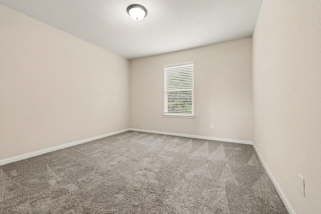 Image 18 of property listing at 7711 Boulder Sunstone Lane, Conroe, TX 77304