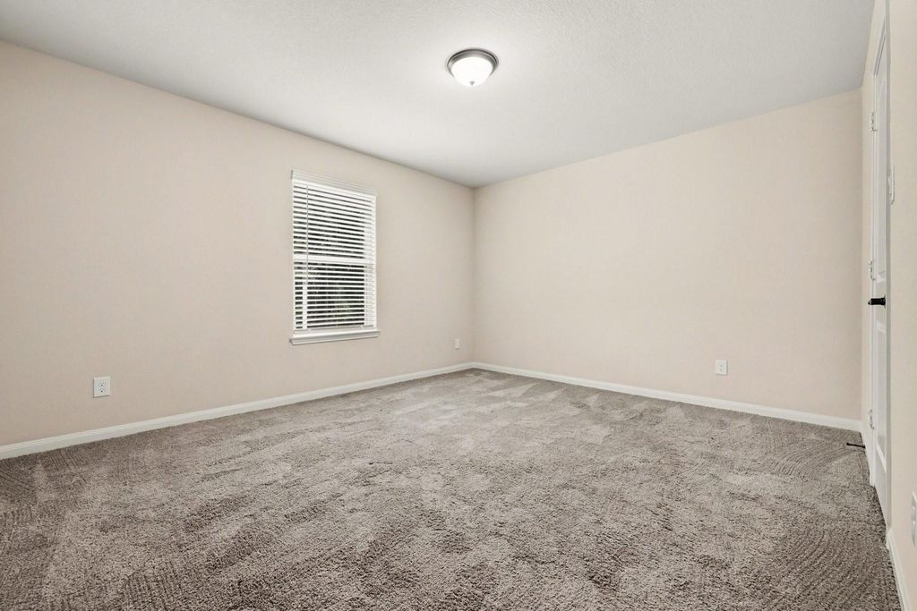 Image 19 of property listing at 7711 Boulder Sunstone Lane, Conroe, TX 77304