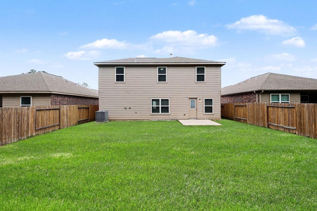 Image 25 of property listing at 7711 Boulder Sunstone Lane, Conroe, TX 77304