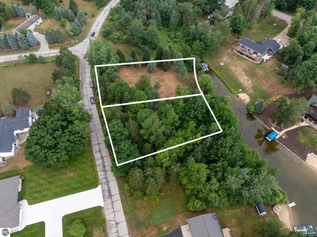 Image 1 of property listing at 1009 Cantabrian Drive, Weidman, MI 48893