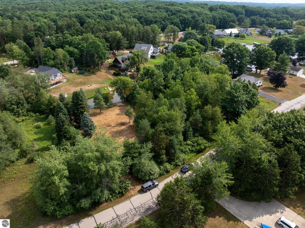 Image 24 of property listing at 1009 Cantabrian Drive, Weidman, MI 48893