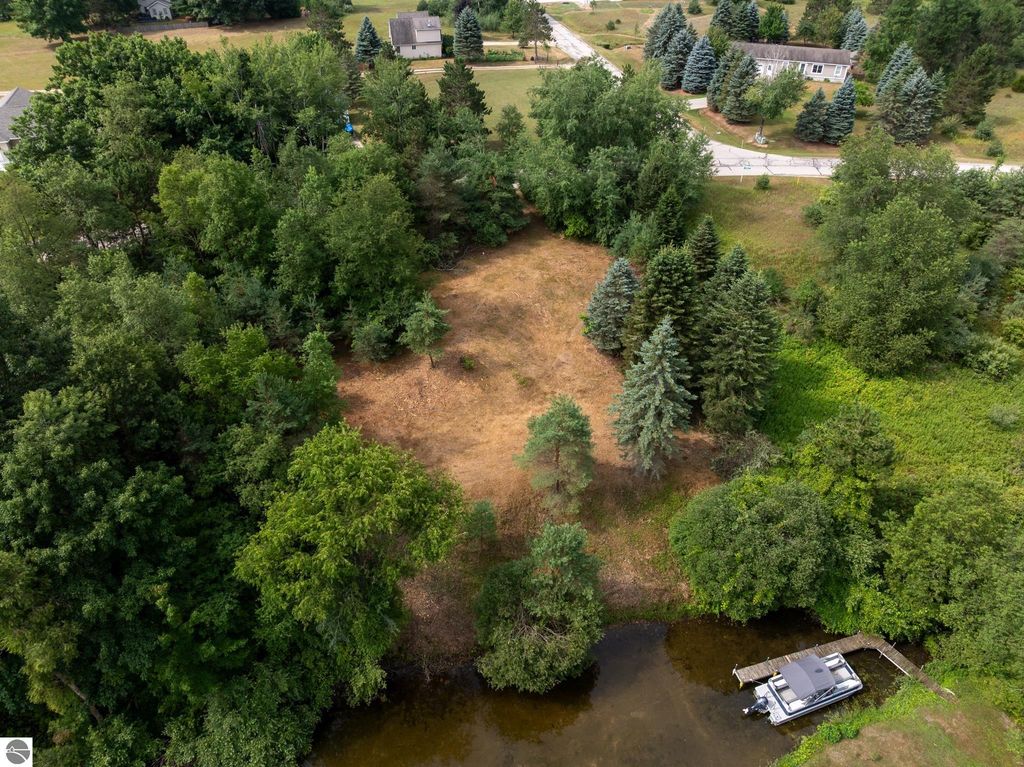 Image 28 of property listing at 1009 Cantabrian Drive, Weidman, MI 48893