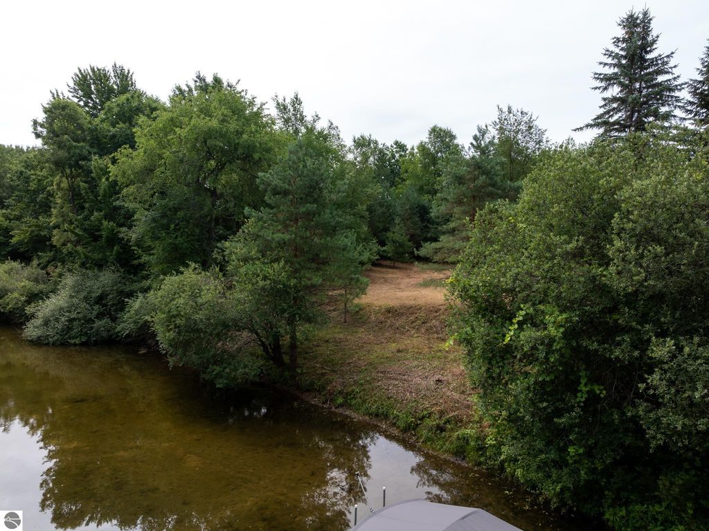 Image 32 of property listing at 1009 Cantabrian Drive, Weidman, MI 48893