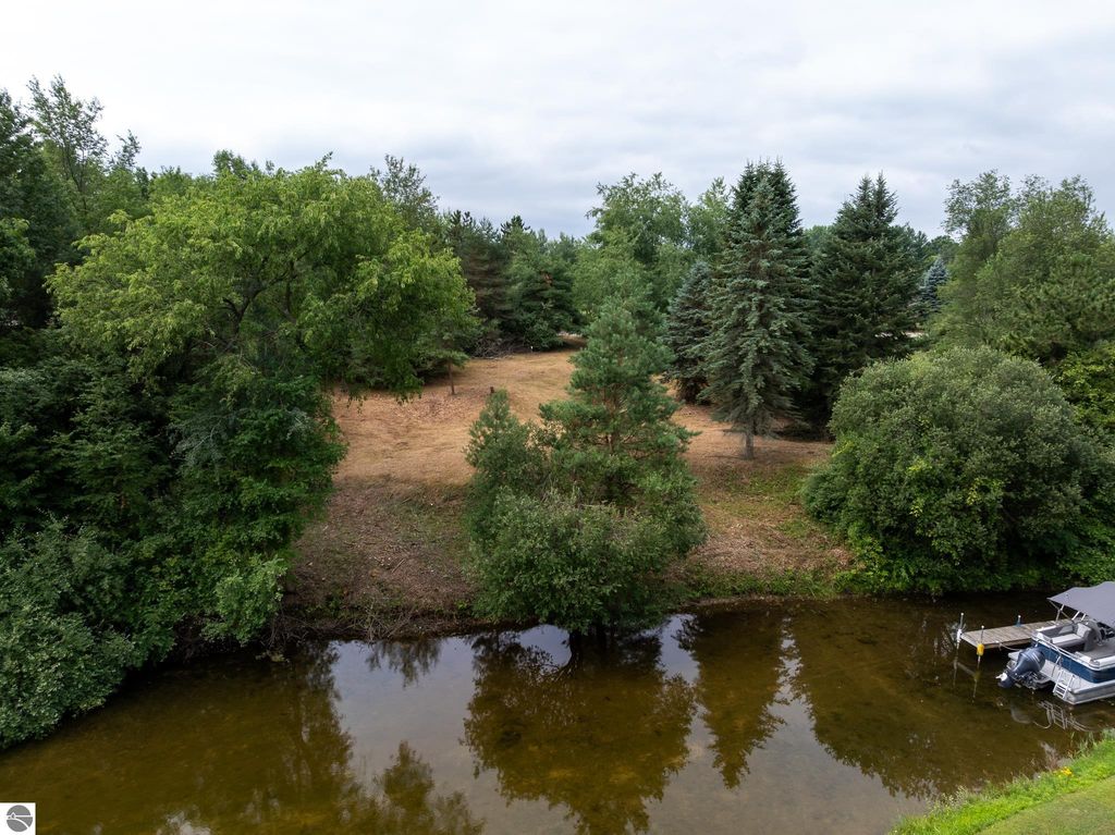 Image 35 of property listing at 1009 Cantabrian Drive, Weidman, MI 48893