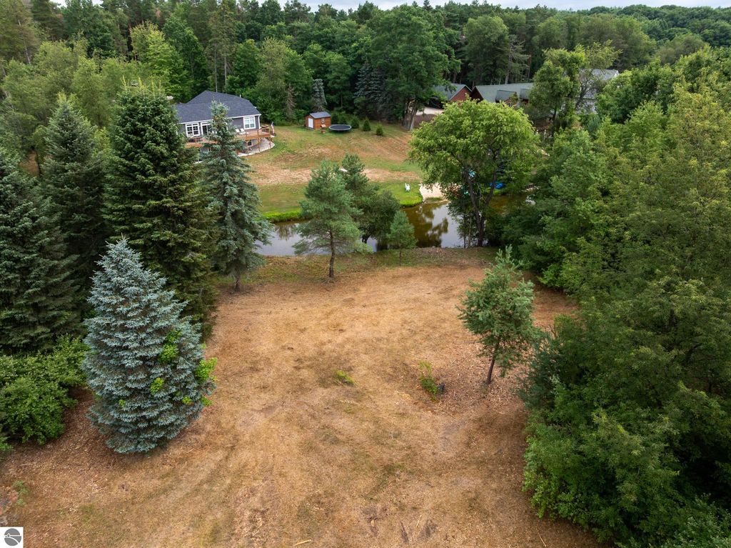 Image 38 of property listing at 1009 Cantabrian Drive, Weidman, MI 48893