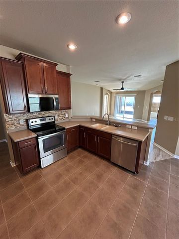 11543 TANGLE CREEK BOULEVARD, Gibsonton, FL 33534