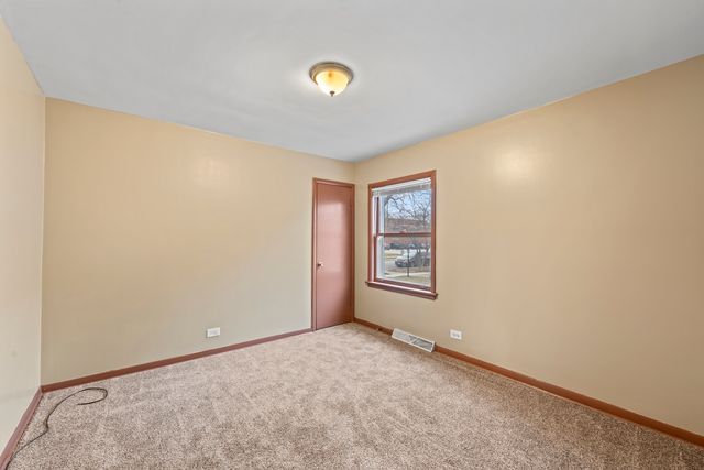 13904 S Tracy Avenue, Riverdale, IL 60827