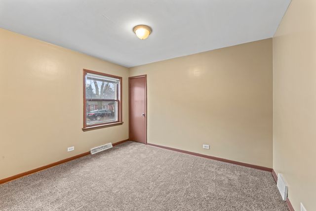 13904 S Tracy Avenue, Riverdale, IL 60827