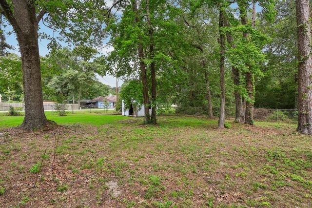 2703 N Colosseum Court, New Caney, TX 77357